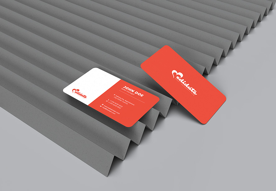 Medidate Business Card – Sleek two-sided design displayed over a metallic surface, blending industrial aesthetics with refined composition.