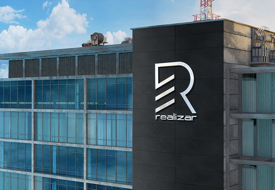 Realizar Logo – Large-scale branding featured prominently on the exterior of a multi-floor building, reinforcing corporate presence.